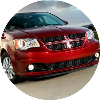 Red Dodge Grand Caravan front grille