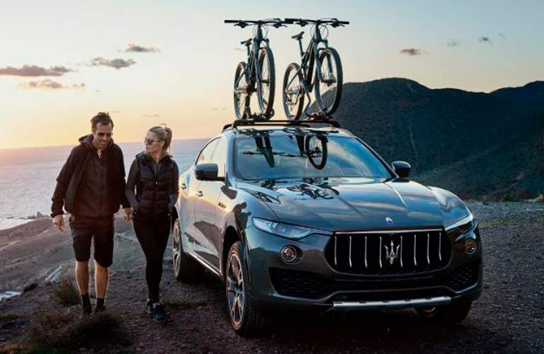 Beautiful Changes Black 2018 Maserati Levante GranLusso With Bike Rack Next To Young Couple On Beach Overlook At Throughout Maserati Levante Changes 2018 maserati levante changes. Beautiful Changes Black 2018 Maserati Levante GranLusso With Bike Rack Next To Young Couple On Beach Overlook At Throughout Maserati Levante Changes
