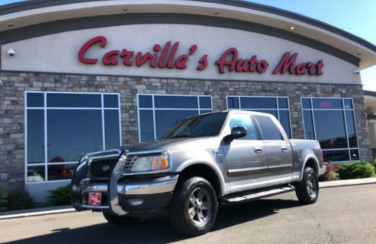 2002 Ford F-150 Lariat with grille bumper at Carville's Auto Mart