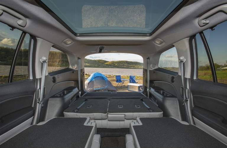 Rows of seating folded down inside 2018 Honda Pilot