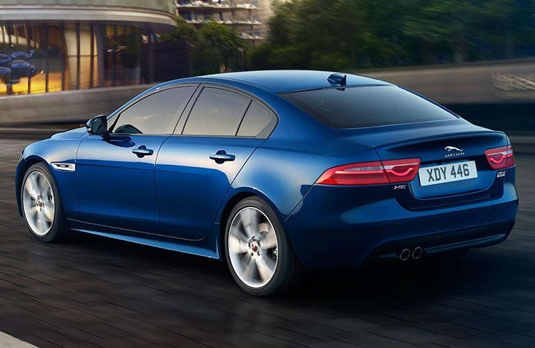 Blue 2018 Jaguar XE Rear Exterior on City Street