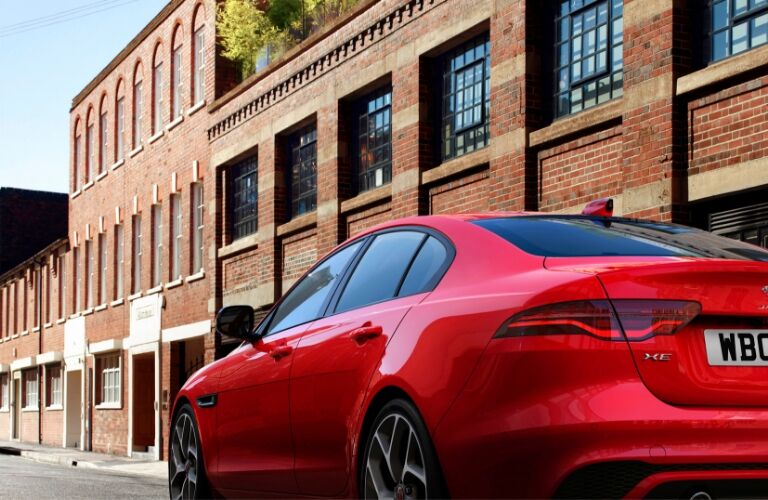 Red 2020 Jaguar XE Rear Exterior on a City Street