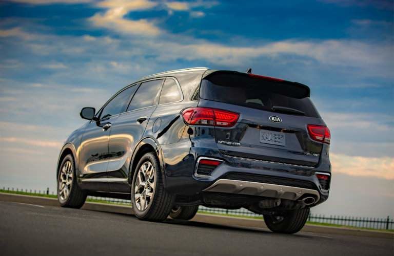 2018 Kia Sorento from the rear against a blue sky