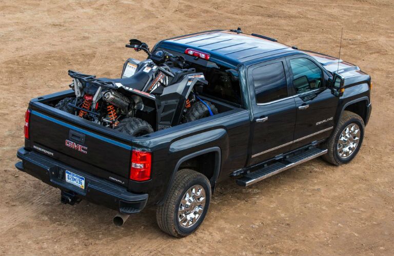 2018 GMC Sierra 2500HD Denali hauling a four-wheeler