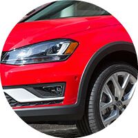 red 2017 VW Golf Alltrack front headlight