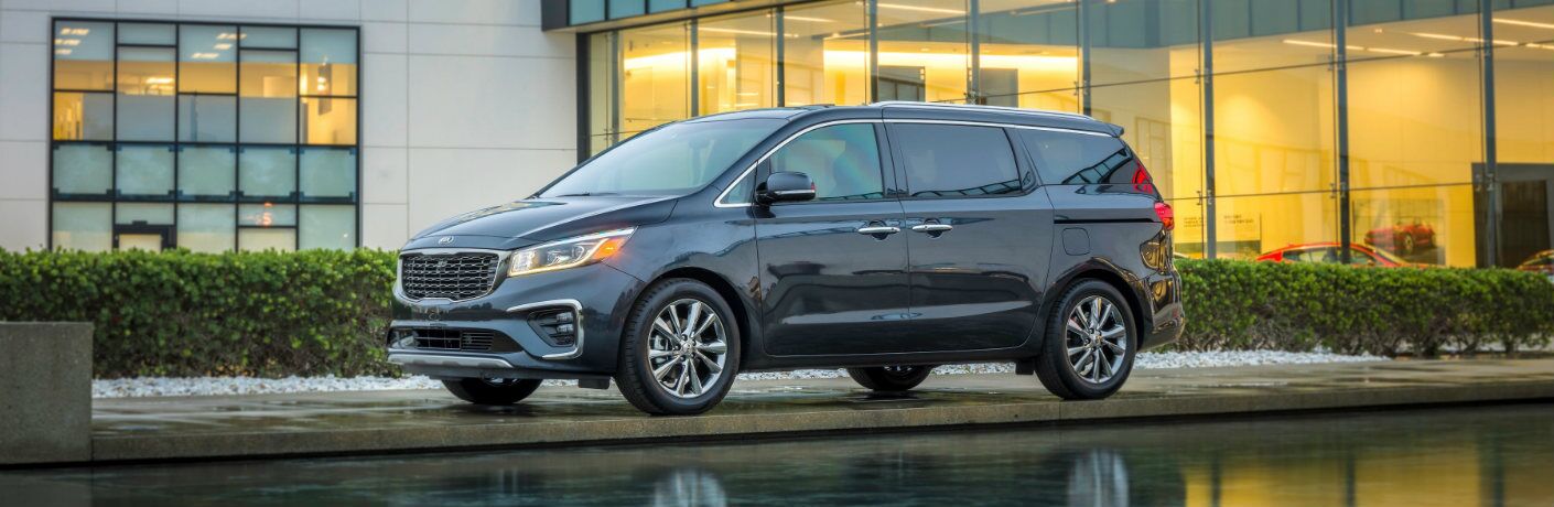2019 Kia Sedona parked outside building