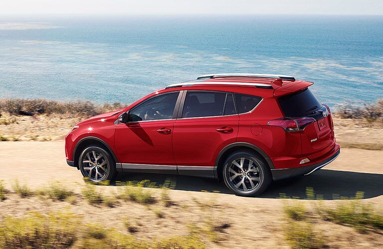 Red 2017 Toyota RAV4 on Dirt Road