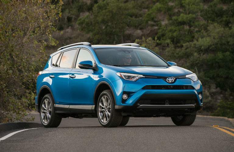Blue 2018 Toyota RAV4 Front Exterior on Country Highway