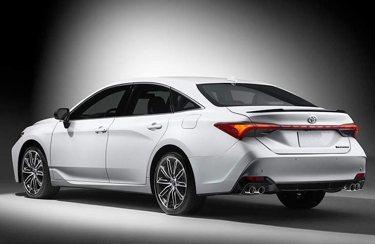 White 2019 Toyota Avalon Rear Exterior on Gray Background