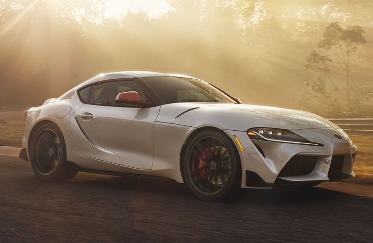 White 2020 Toyota Supra Front and Side Exterior on a Track