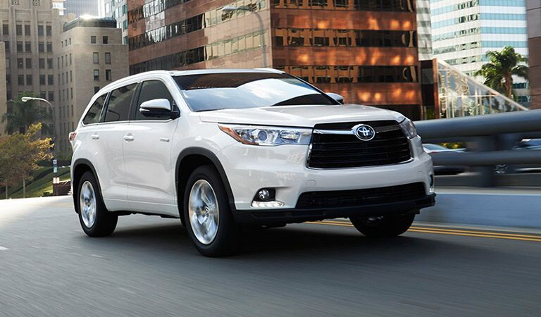 White 2016 Toyota Highlander on Road