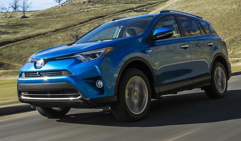 Blue 2016 Toyota RAV4 on Road