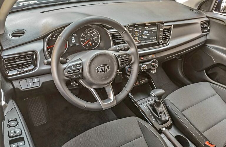 Grey dashboard and front seats in 2020 Kia Rio