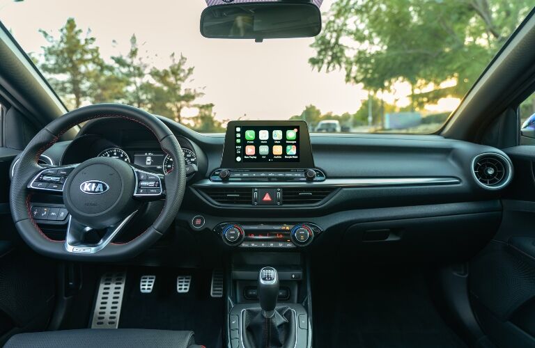 Steering wheel, gauges, and touchscreen in 2020 Kia Forte
