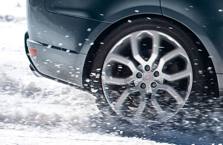 wheel close up of a 2016 Land Rover Range Rover in the snow