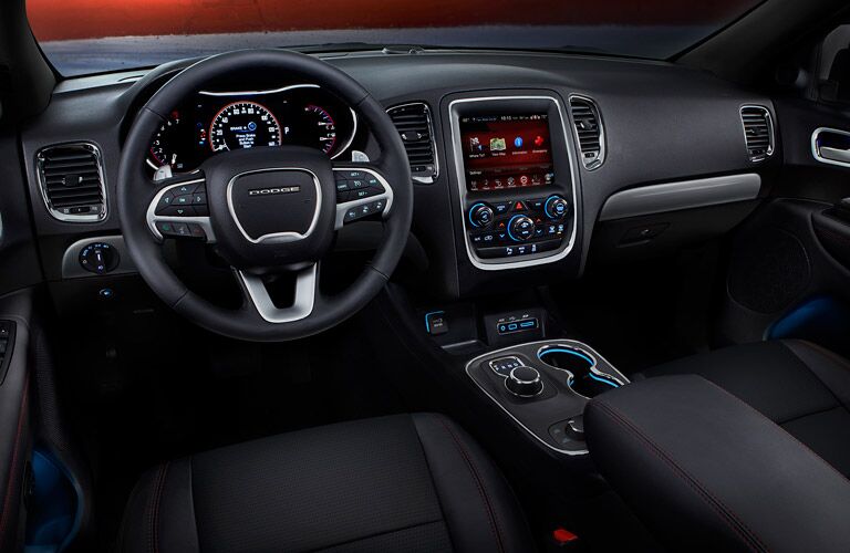 steering wheel and dashboard view of the 2016 Dodge Durango