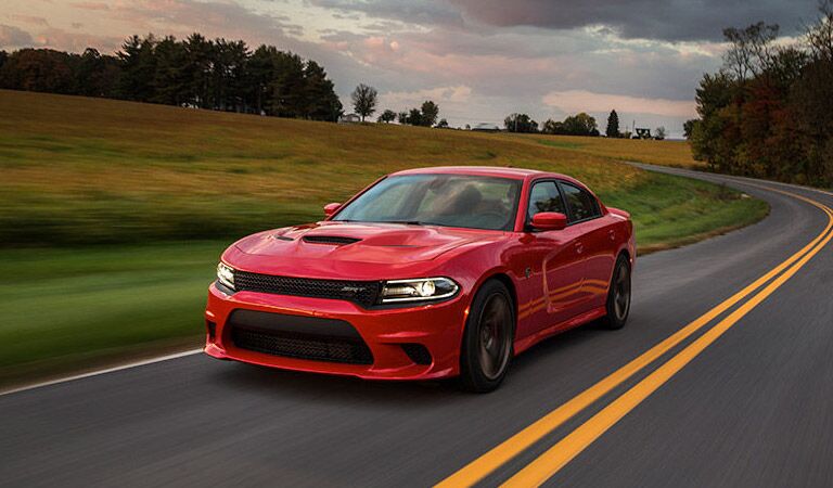 red 2016 Dodge Charger on a country road