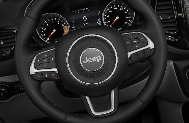 steering wheel of the 2017 Jeep Compass
