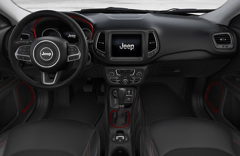 steering wheel and infotainment system of the 2018 Jeep Compass Trailhawk