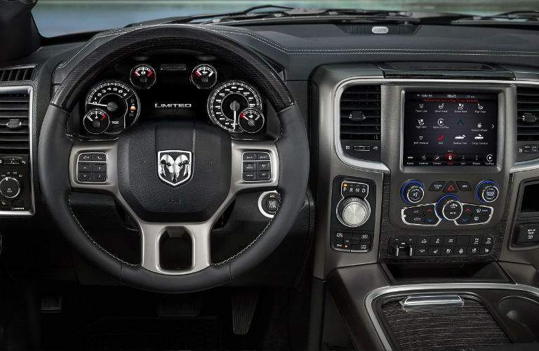 steering wheel and Uconnect system of the 2018 Ram 1500 Limited