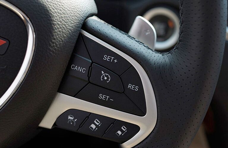 Closeup of buttons on steering wheel in 2019 Dodge Durango