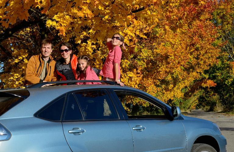 family taking a fall road trip