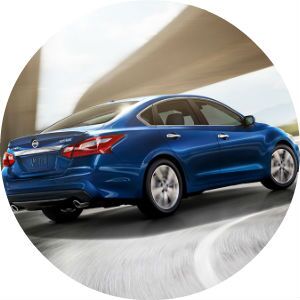 blue 2017 Nissan Altima rounding a corner