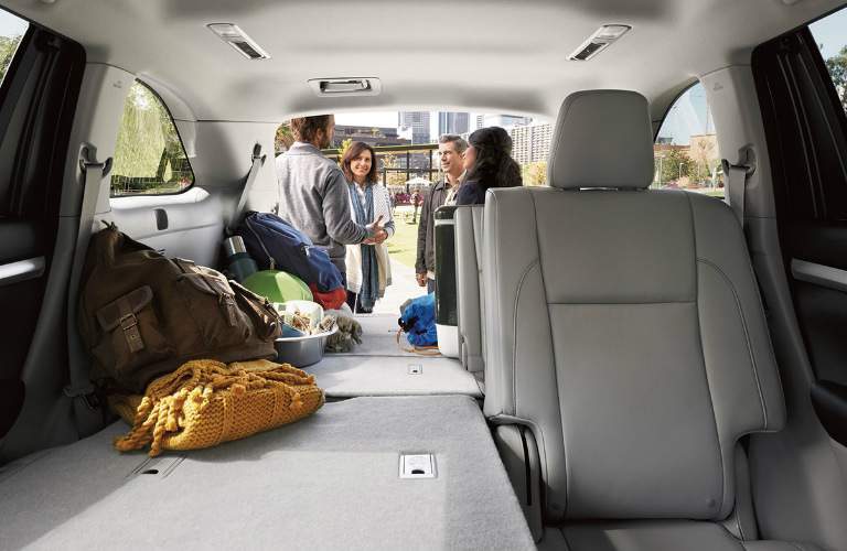 2018 Toyota Highlander Hybrid cargo space with some of the rear seats folded flat