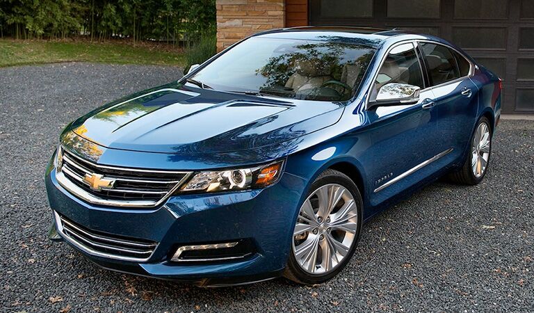 front and side view of blue 2018 chevrolet impala