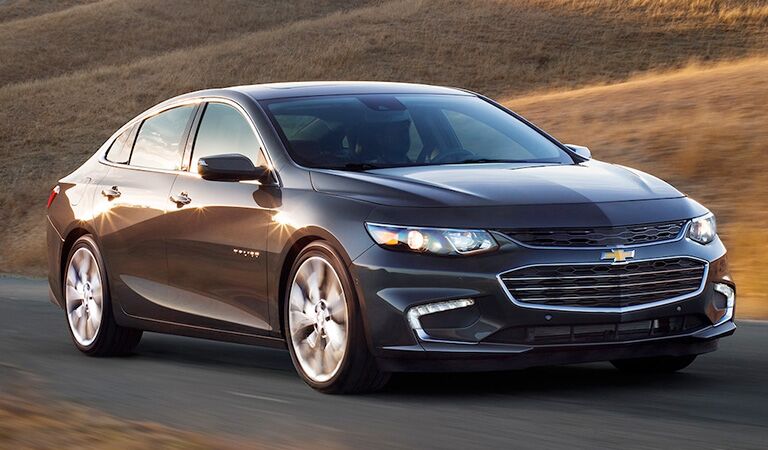 front and side view of black 2018 chevrolet malibu