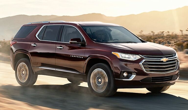 front and side view of red 2018 chevrolet traverse