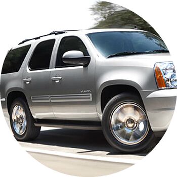 silver 2010 GMC Yukon exterior side