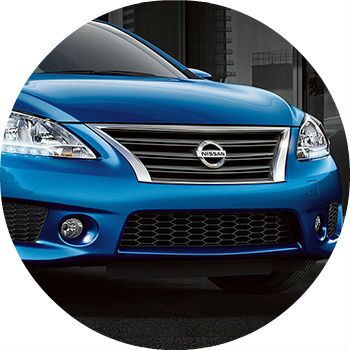 blue 2013 Nissan Maxima front grille
