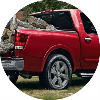 red 2013 Nissan Titan pickup bed
