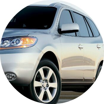 silver Hyundai Santa Fe exterior driver side