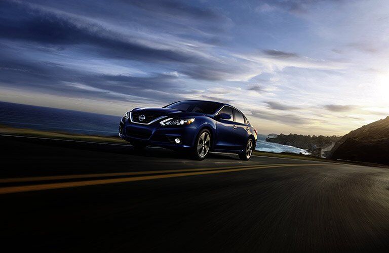 Blue 2017 Nissan Altima at Night