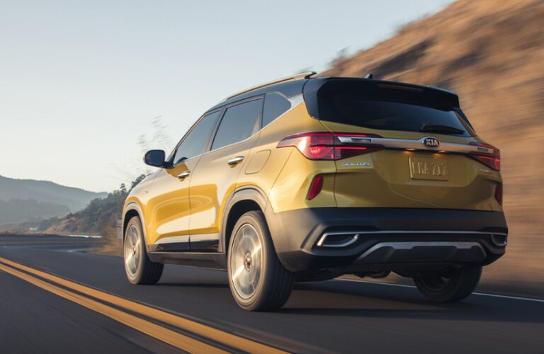 2021 Kia Seltos rear view driving