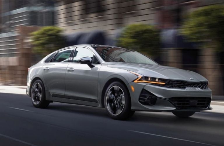 2021 Kia K5 driving front view