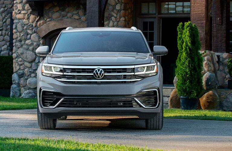 2020 VW Atlas Cross Sport grey exterior front parked in front of house