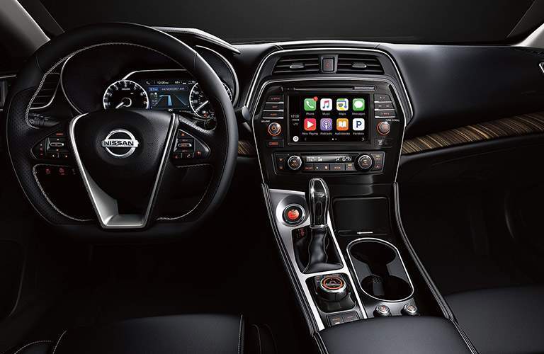 front interior of 2018 nissan maxima including steering wheel, dashboard and infotainment system