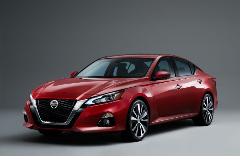 A front left quarter photo of the 2020 Nissan Altima in a photo studio.