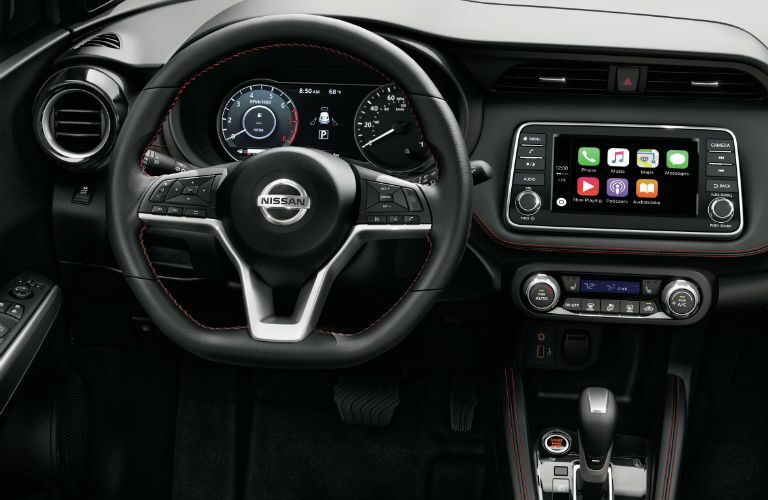A photo of the driver's cockpit in the 2019 Nissan Kicks.