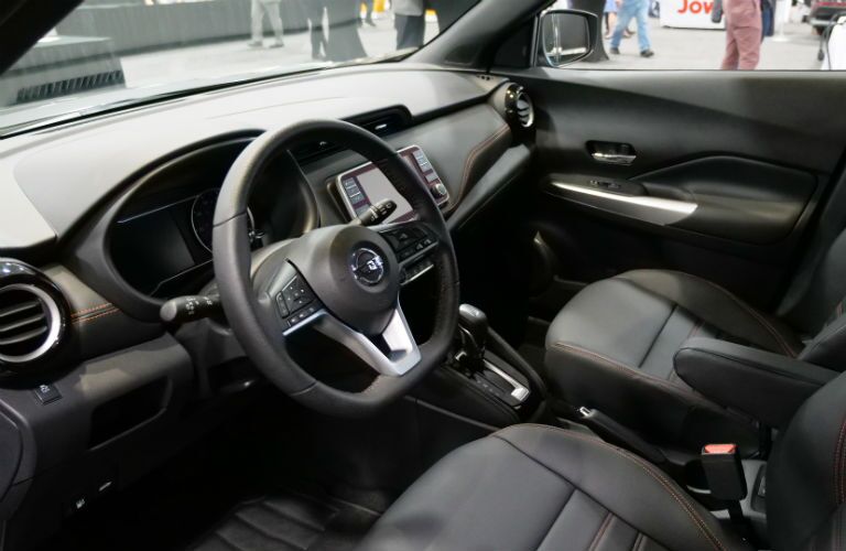A photo of the front seats of the 2019 Nissan Kicks.