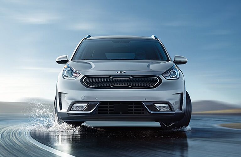 silver 2019 kia niro on water