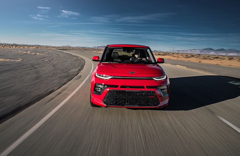 2020 Kia Soul driving down a highway