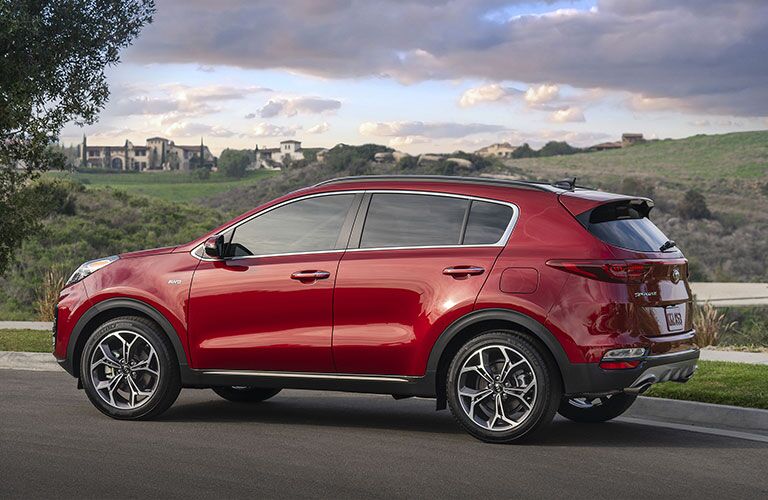 Red 2020 Kia Sportage out in the country