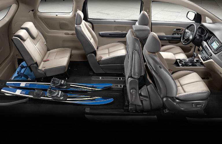 2018 Kia Sedona interior with rear seats partially collapsed