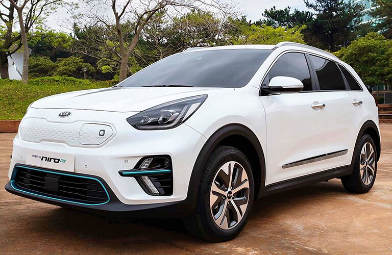 Front/side profile of white 2019 Kia Niro