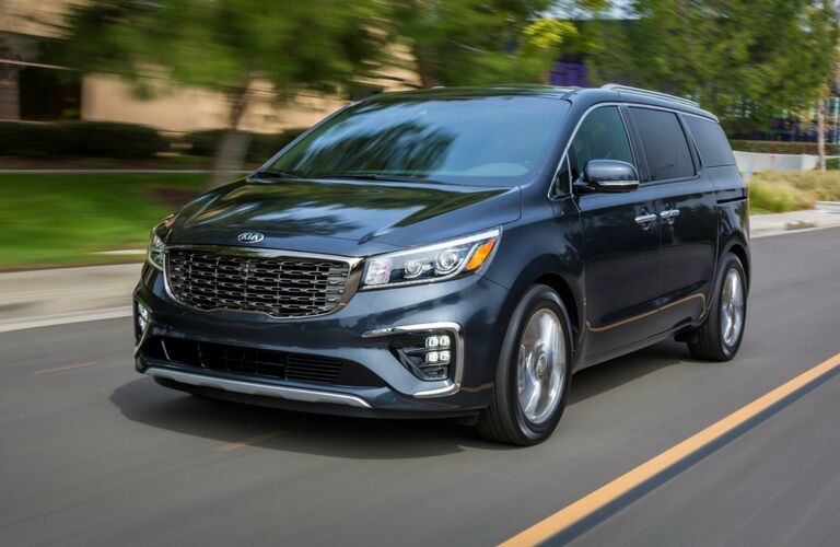 2019 Kia Sedona on a suburban road