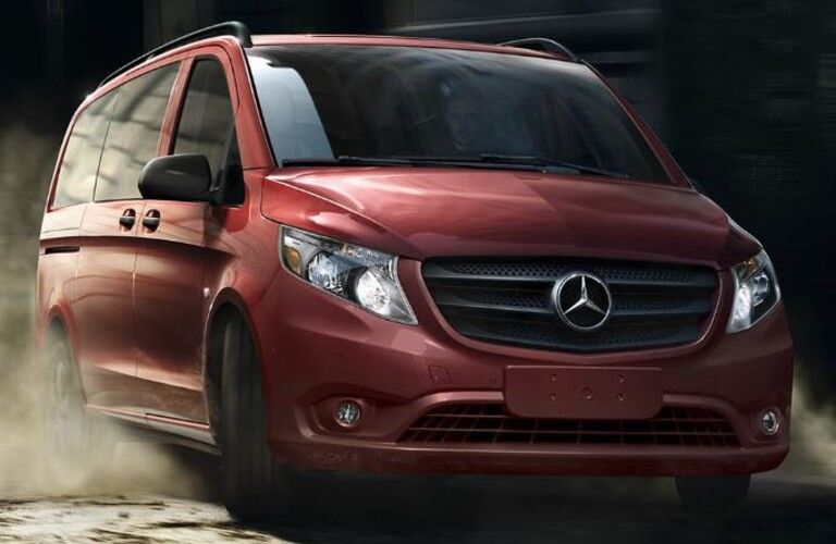 red mercedes-benz metris passenger van front view